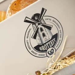 Stigby 2-in-1 Brotkasten Mit Schneidebrett Metallblech Bambus -Bestes Haushaltsgeräte Geschäft 10038121 yy 0004 logo