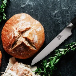 Comfort Pro Serie 6" Allzweckmesser Wellenschliff 56 HRC Edelstahl -Bestes Haushaltsgeräte Geschäft 10039034 yy 0004 logo